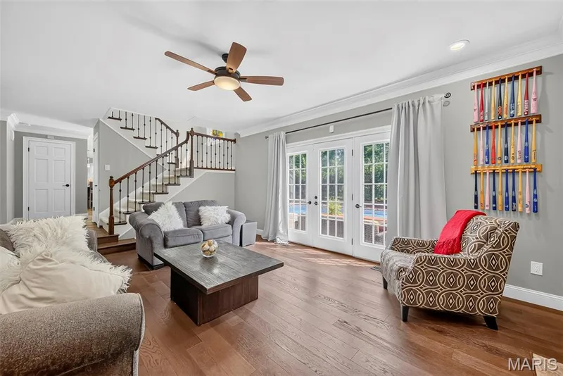 The family room, where you can sit and enjoy the view of the pool. — 2024 Meadowbrook Way Drive, Chesterfield, MO 63017