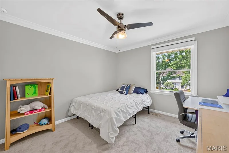 Bedroom 3 with lighted ceiling fan, new carpet, and crown molding. — 2024 Meadowbrook Way Drive, Chesterfield, MO 63017