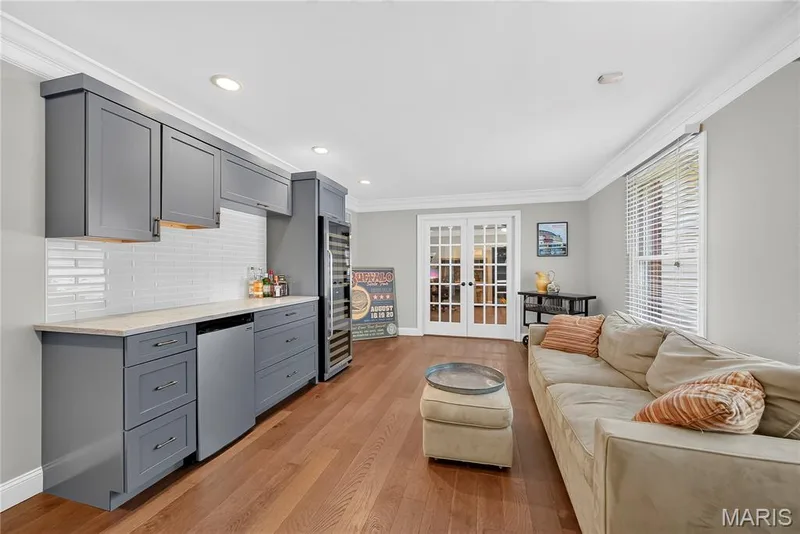 Another view of the living room with the office, through the french doors, at the back of the living room. — 2024 Meadowbrook Way Drive, Chesterfield, MO 63017