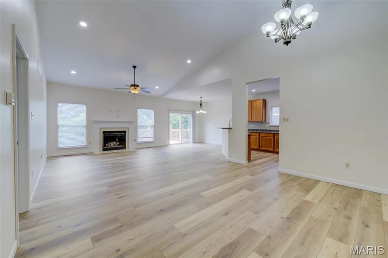 The Family Room/Dining Room combo with BRAND NEW LAMINATE FLOOR — 508 Newkirk Circle, St Peters, MO 63303