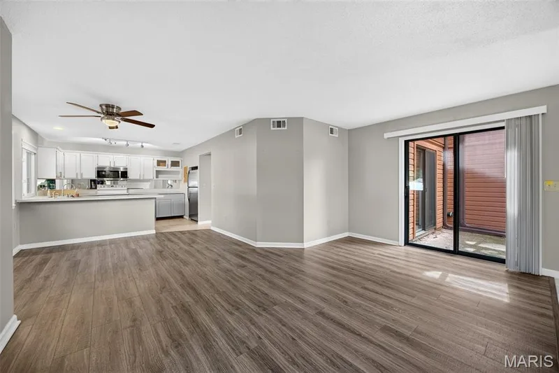 Kitchen, Dining Room Living Room & Sliding Glass door to private patio. — 408 Kipling Way #A, Weldon Spring, MO 63304