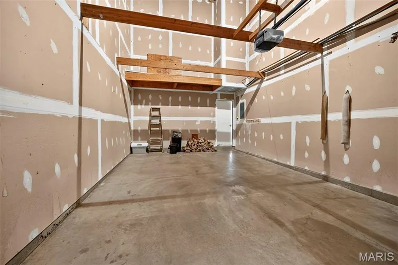 Inside Private Garage w/ Storage & Door to Unit. — 408 Kipling Way #A, Weldon Spring, MO 63304