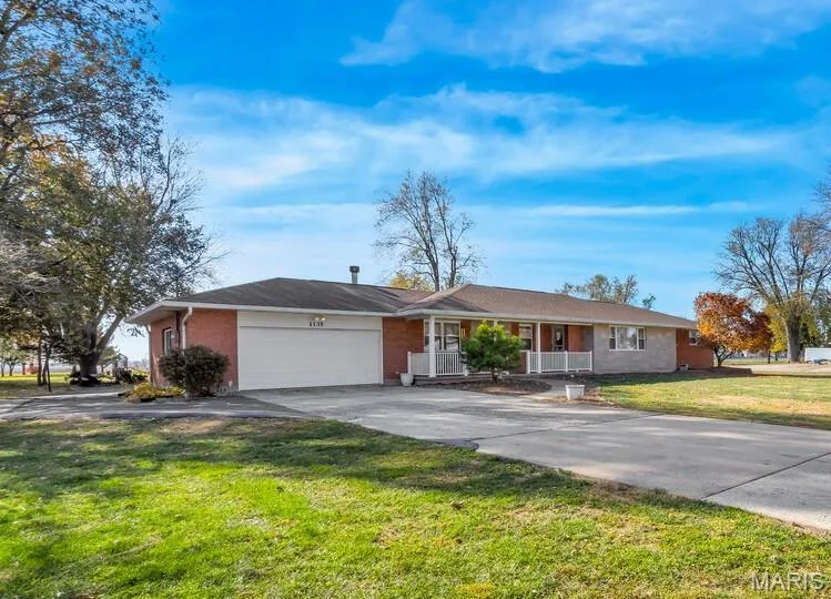 1135 Common Field Street, Portage Des Sioux, MO 63373 — listing photo 1 of 54