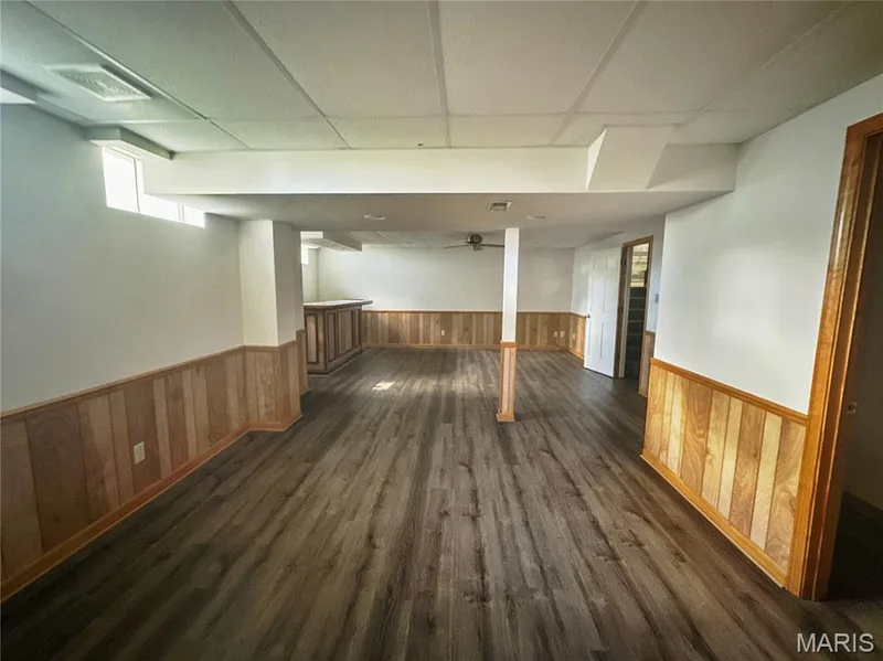 lower level family room — 7377 Little Oaks Drive, O'Fallon, MO 63368