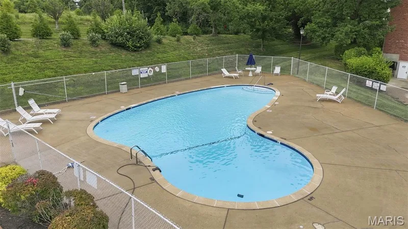 Enjoy the community pool and club house. — 1525 Hampton Hall Drive #22, Chesterfield, MO 63017