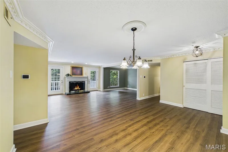 Dining room flows to living room and bonus room. — 1525 Hampton Hall Drive #22, Chesterfield, MO 63017