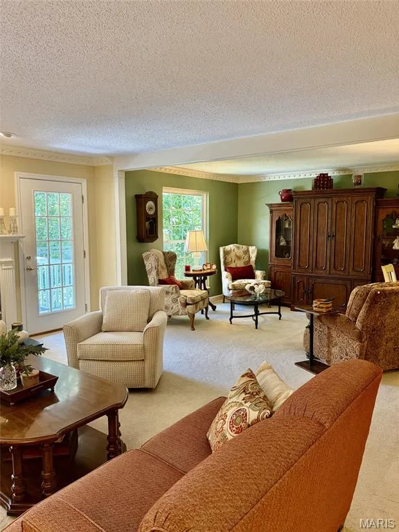 Cozy bonus room showcasing use ad office or study  an abundance of light from multiple windows — 1525 Hampton Hall Drive #22, Chesterfield, MO 63017