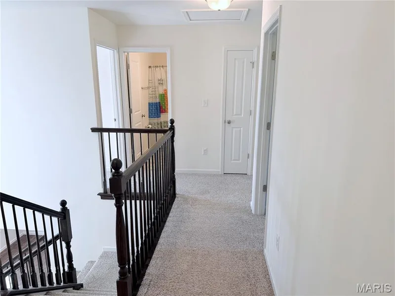 Upstairs has 4 spacious bedrooms and 2 full baths. — 425 Dusty Brook Drive, O'Fallon, MO 63366
