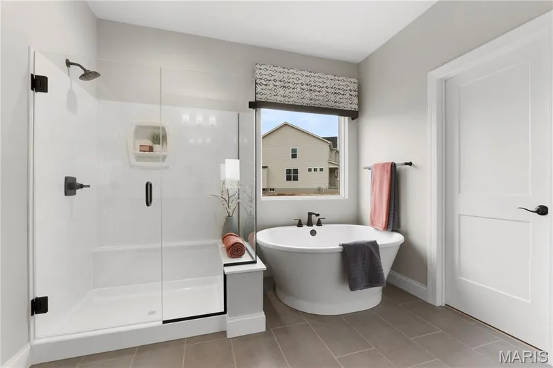 Luxury Primary Bathroom with double rectangular wave bowls, Separate Shower and Soaking Tub — 14 Cedarstone Court, Dardenne Prairie, MO 63368