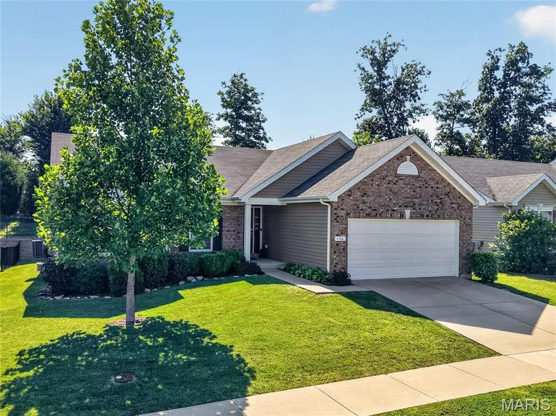 Located in Wentzville Timberland Schools in the Desirable Wyndstone Neighborhood! — 156 Hidden Bluffs Drive, Lake St. Louis, MO 63367