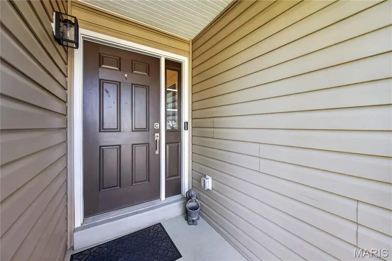 Covered Entry with Glass Sidelight! — 156 Hidden Bluffs Drive, Lake St. Louis, MO 63367