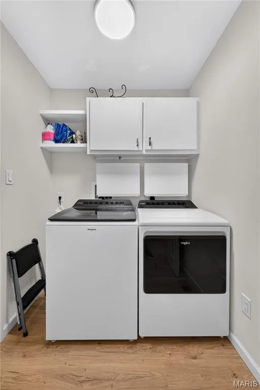 Main Floor Laundry with Coat Closet, Wall Cabinets, Shelves & Storage!  Washer & Dryer STAYS! — 156 Hidden Bluffs Drive, Lake St. Louis, MO 63367