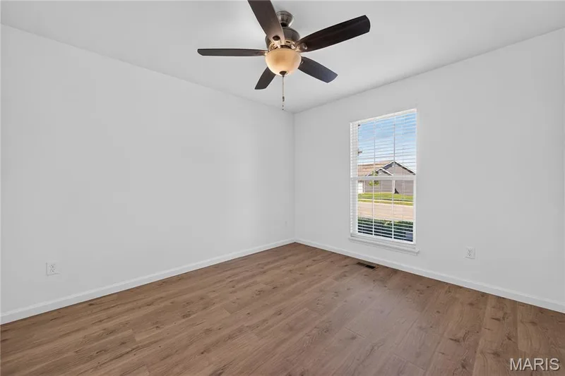Bedroom #3 with Luxury Vinyl Wood Wide-Plank Floors & Ceiling Fan & Light! — 156 Hidden Bluffs Drive, Lake St. Louis, MO 63367