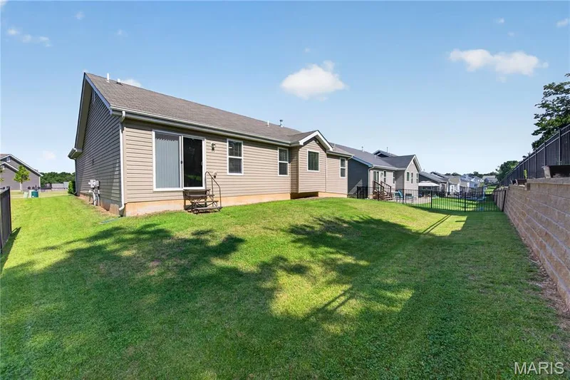 You will LOVE the ability to enjoy the Backyard from your Slider! — 156 Hidden Bluffs Drive, Lake St. Louis, MO 63367