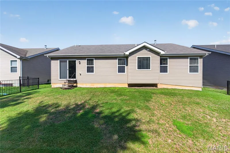 Seller has the 2 pieces of Metal Fencing to Fully Enclose the Backyard! — 156 Hidden Bluffs Drive, Lake St. Louis, MO 63367