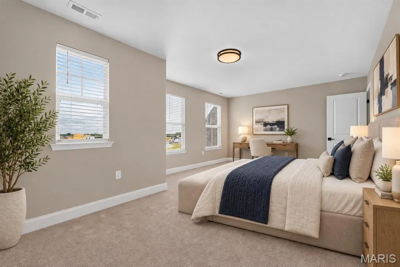 Recessed lighting, neutral wall tones, white trim, multiple windows, and walk-in closet — 26 Valor Way, O'Fallon, MO 63385
