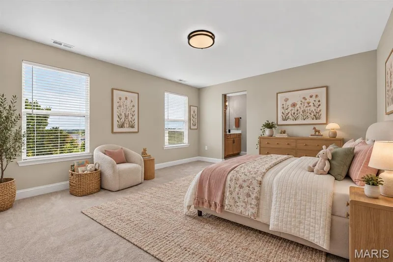 Recessed lighting, light-toned carpeting, and multiple windows. Also features a walk-in closet and Jack and jill bathroom. — 26 Valor Way, O'Fallon, MO 63385