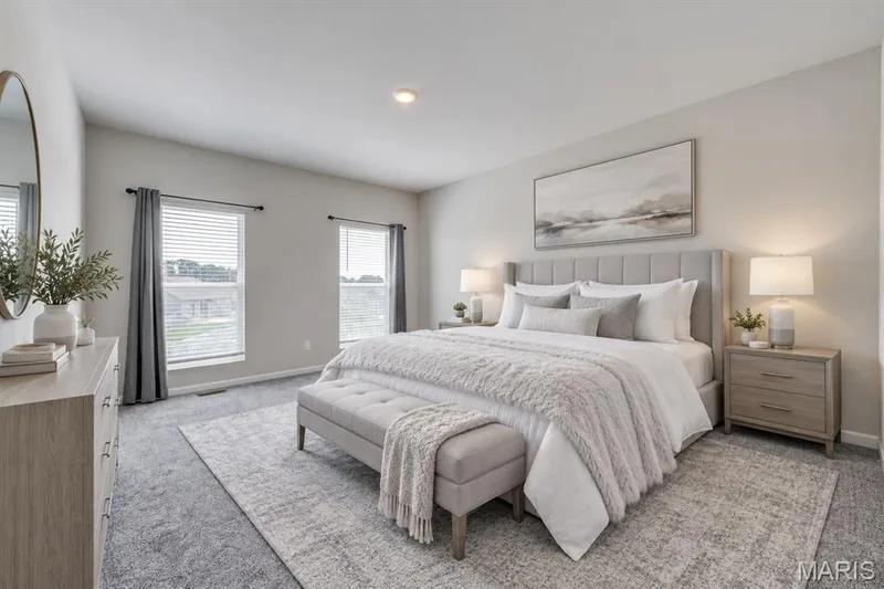 Virtually staged primary bedroom with luxury bath and large walk-in closet — 118 Riding Crop Lane, Wentzville, MO 63385