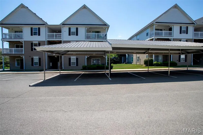 1 Covered Carport Space and 1 additional assigned parking space — 15103 Spring Creek Lane, O'Fallon, MO 63368