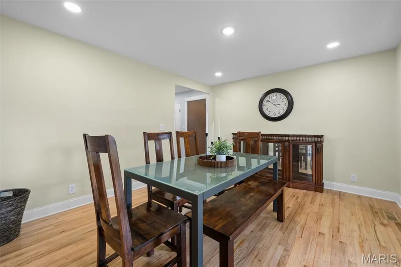 Formal dining room with new hardwood floors — 312 Diplomat Lane, Chesterfield, MO 63017