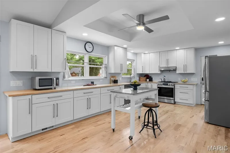 Updated kitchen with new cabinets, floors and LG appliances — 312 Diplomat Lane, Chesterfield, MO 63017