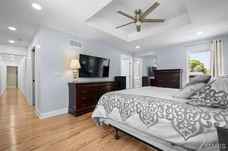 Re-finished hardwood floors throughout the primary, hall and addtional bedrooms — 312 Diplomat Lane, Chesterfield, MO 63017