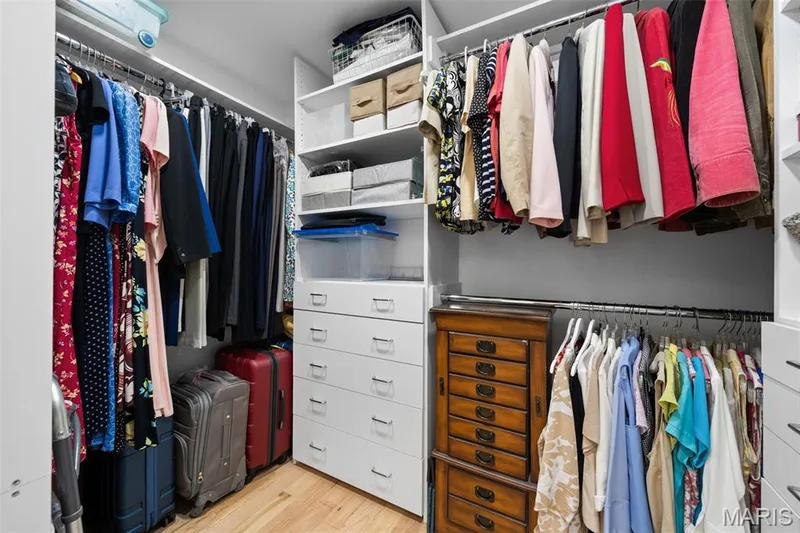 Large walk-in closet in primary with built-ins PLUS two additional closets! — 312 Diplomat Lane, Chesterfield, MO 63017