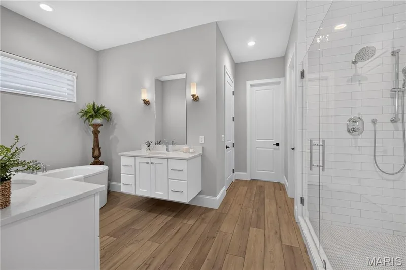 Door next to shower is to a huge walk-in closet. — 16529 Waterfront Avenue, Chesterfield, MO 63017