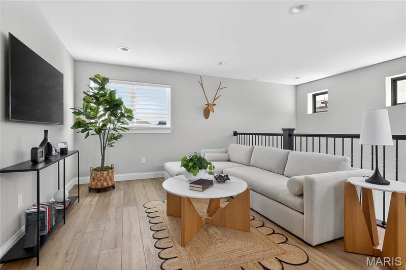 Private loft/tv and seating area for second floor guests — 16529 Waterfront Avenue, Chesterfield, MO 63017