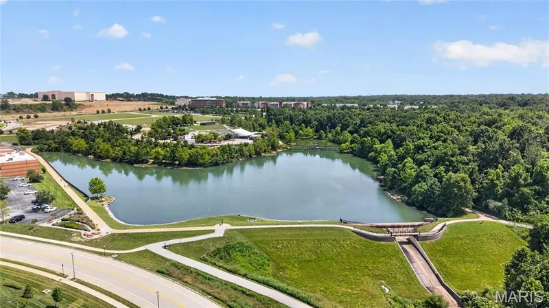 View of lake and walking trails across the street from this home — 16529 Waterfront Avenue, Chesterfield, MO 63017