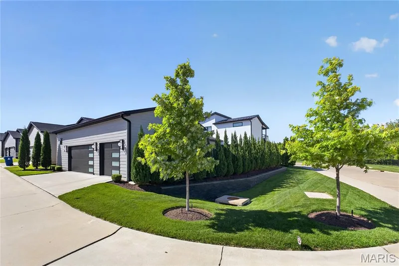 Back and side are very private with extensive landscaping — 16529 Waterfront Avenue, Chesterfield, MO 63017