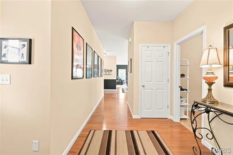 Entry way with wood-finish flooring — 226 City Gate Lane, St Charles, MO 63303