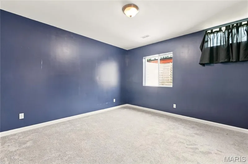 Basement office with egress window and overhead lighting. — 226 City Gate Lane, St Charles, MO 63303