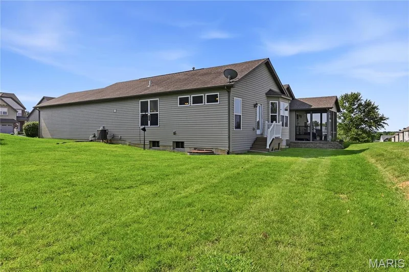Common ground looking at back of structure — 226 City Gate Lane, St Charles, MO 63303