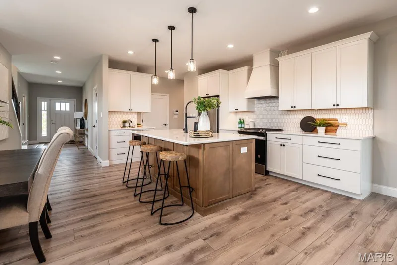 Photo representation of a similar home.  Some features shown may be optional upgrades. — 734 Barnwood Hill Drive, O'Fallon, MO 63385