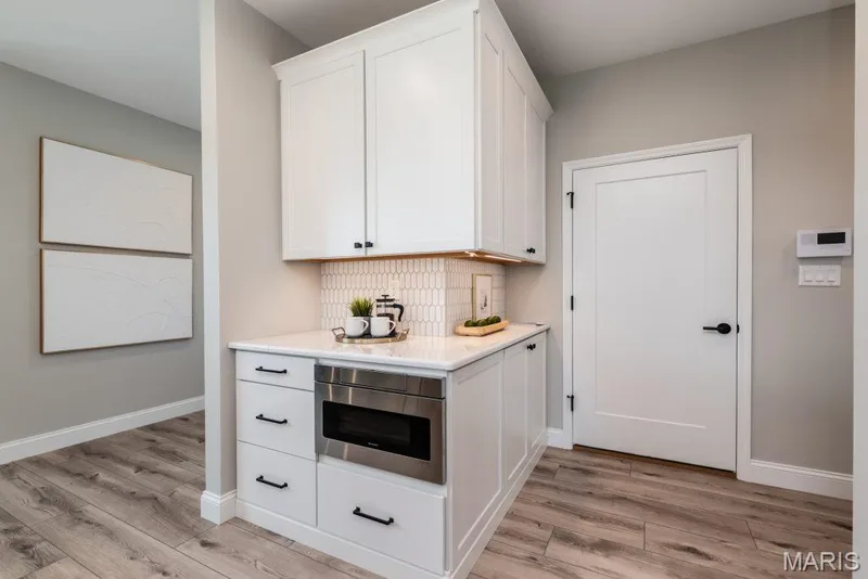 Photo representation of a similar home.  Some features shown may be optional upgrades. — 734 Barnwood Hill Drive, O'Fallon, MO 63385