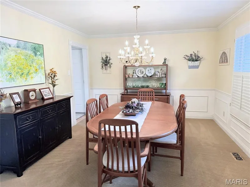 Crown molding throughout with a multi-arm chandelier — 14238 Kinderhook Drive, Chesterfield, MO 63017
