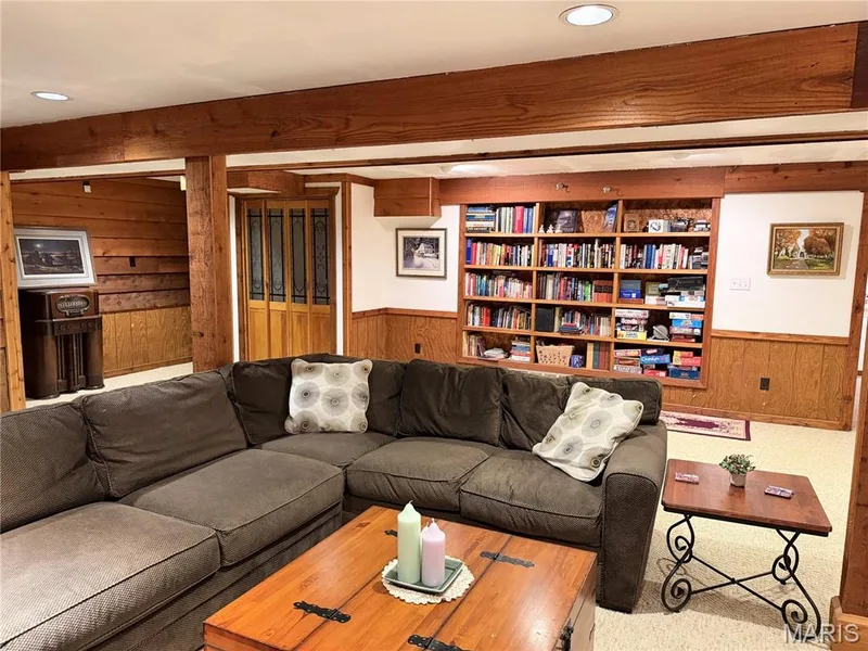 Wood paneling and exposed wood beams create a warm aesthetic — 14238 Kinderhook Drive, Chesterfield, MO 63017