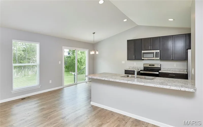 Another view of this very open concept home and light and bright windows. — 133 Day Lily Lane, Wentzville, MO 63385