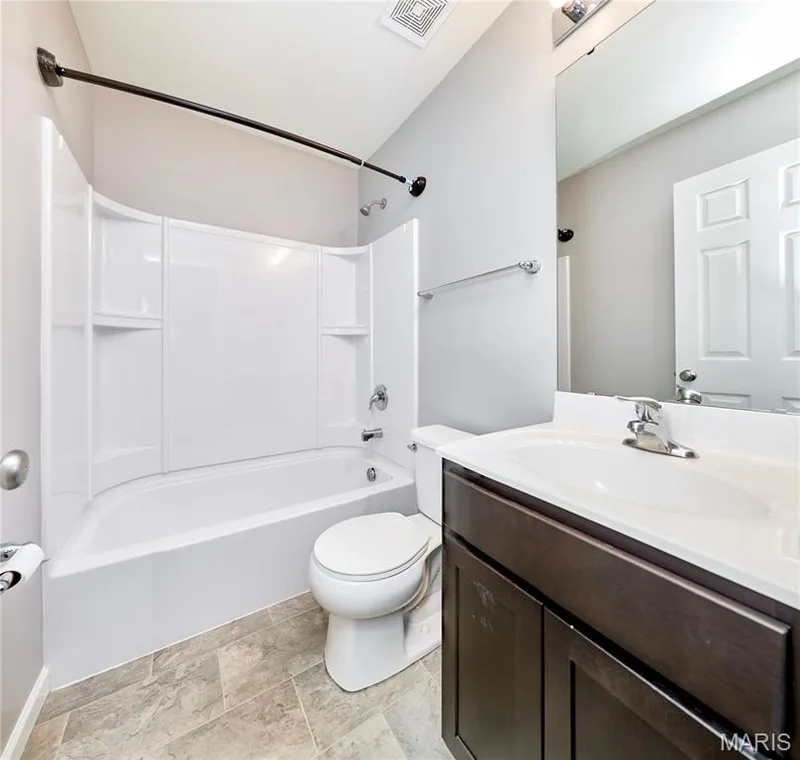 The 2nd of 3 full baths in this home! This one includes a tub/shower and is located on the main level. — 133 Day Lily Lane, Wentzville, MO 63385