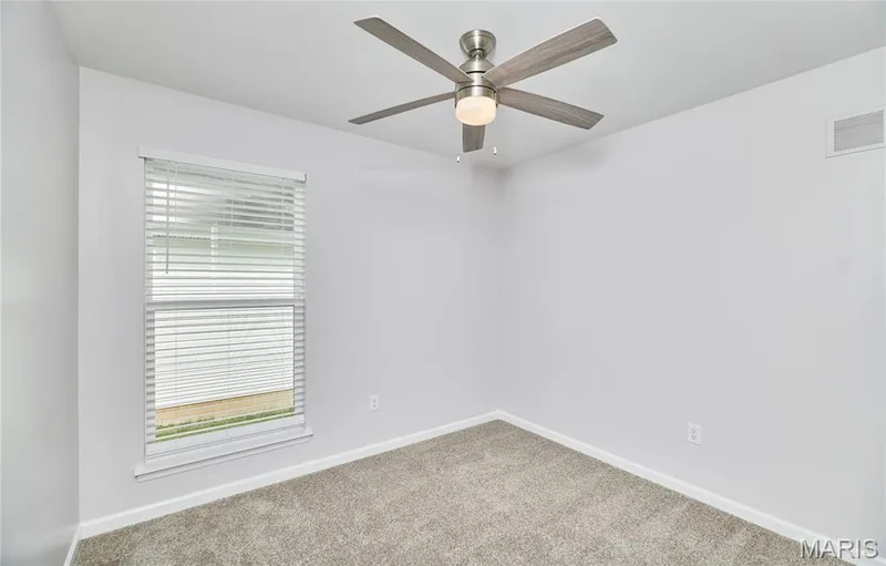 Bedroom #3, also with lovely ceiling fan and window with blinds. — 133 Day Lily Lane, Wentzville, MO 63385