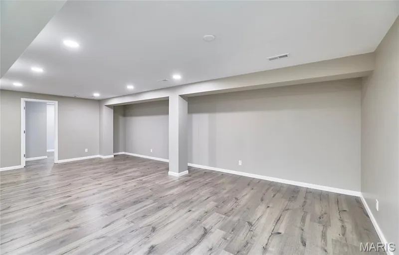 Over 700 sf of additional living space. No need to have this done later ... it's finished for you. — 133 Day Lily Lane, Wentzville, MO 63385