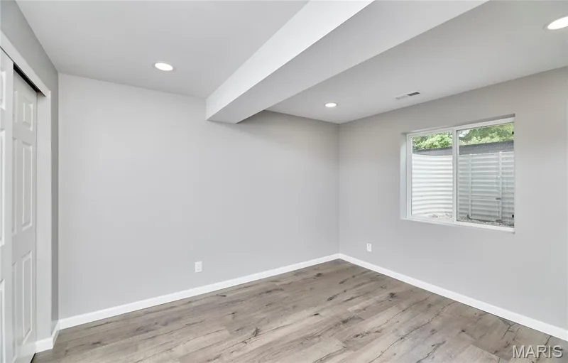 Also, unique is this large 4th bedroom located on the LL. This is an official bedroom with window access. — 133 Day Lily Lane, Wentzville, MO 63385
