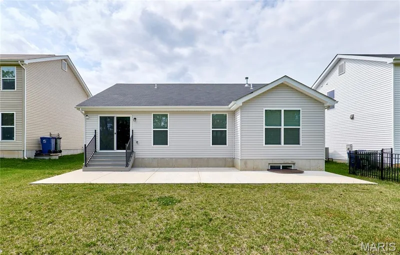 This newer and extra large patio is a bonus and already done for you! Ready for lots of fun and entertaining! — 133 Day Lily Lane, Wentzville, MO 63385