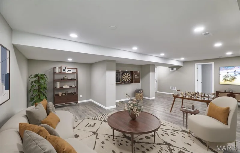 Wow! Beautifully finished and open lower level area for even more living space. — 133 Day Lily Lane, Wentzville, MO 63385
