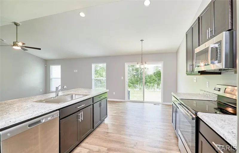 Looking to the Dining area and walkout. — 133 Day Lily Lane, Wentzville, MO 63385