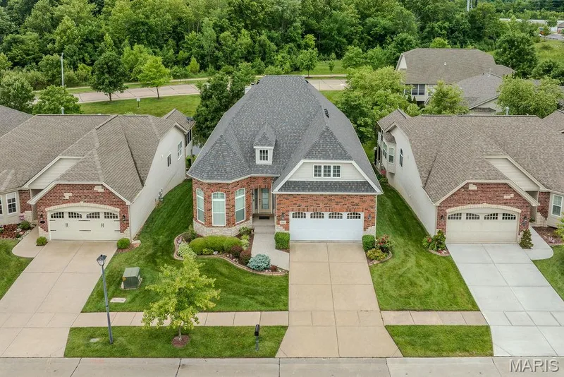 High hip roof to offer 12ft & 10ft ceilings on main floor — 14 Burgundy Place Drive, Dardenne Prairie, MO 63368