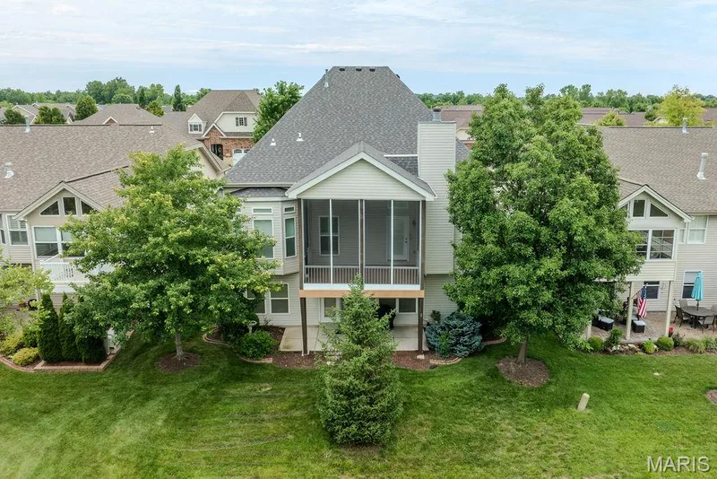 Large screened in deck and covered patio off the back — 14 Burgundy Place Drive, Dardenne Prairie, MO 63368