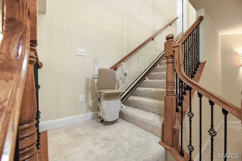 Extra wide staircase to partial finished lower level. Chairlift if needed — 14 Burgundy Place Drive, Dardenne Prairie, MO 63368