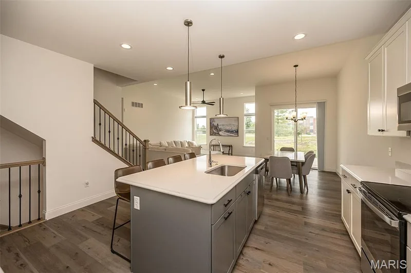 Kitchen features 11ft ceiling and recessed lighting. — 325 Gailin Drive, Lake St. Louis, MO 63367